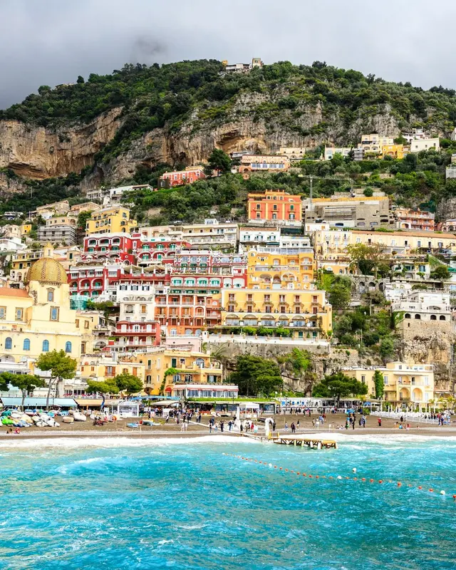 Positano seen from the water, colourful houses on the hill