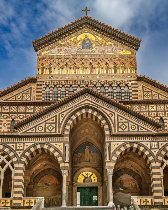 Facade of the cathedral of Amalfi above its wide staircase